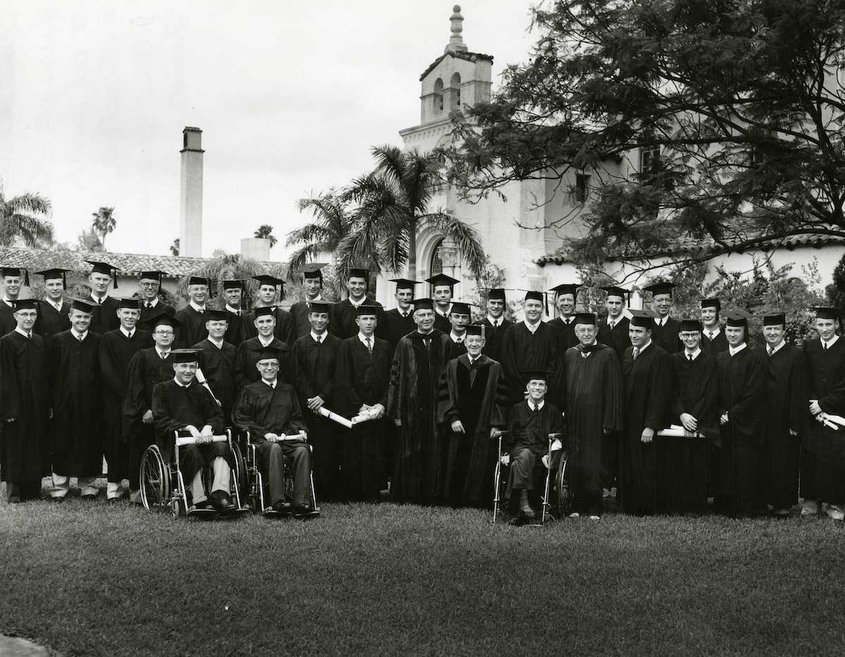 Class of 1959 at graduation with faculty members