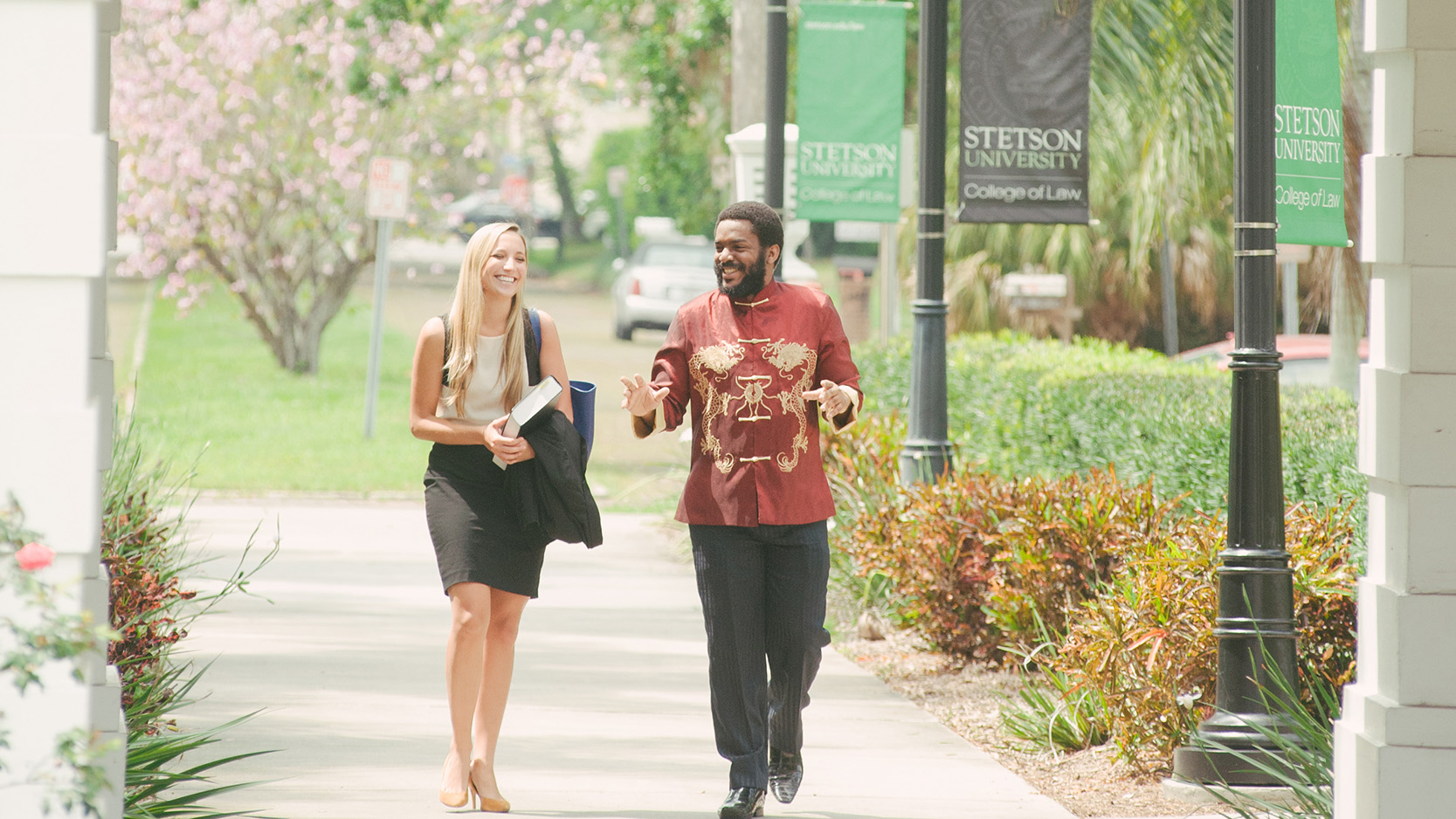 two stetson law students walking on campus