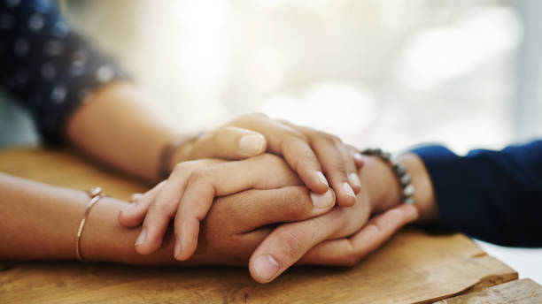 two hands clasped