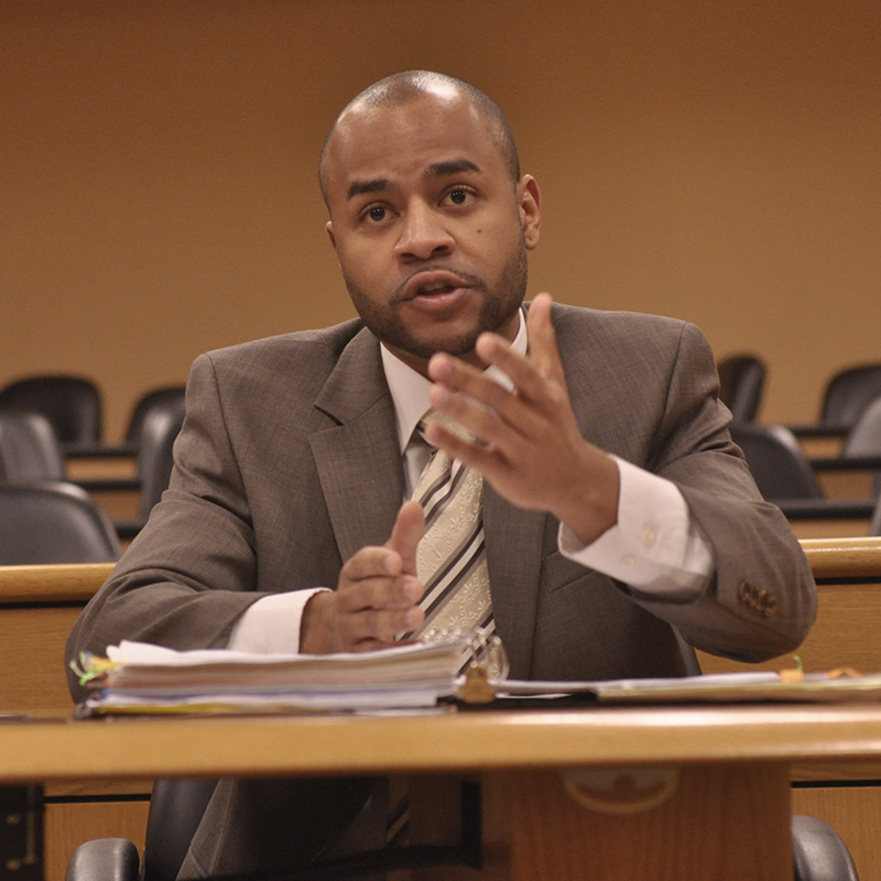 Male student speaks during class