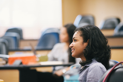 Female student smiles during class