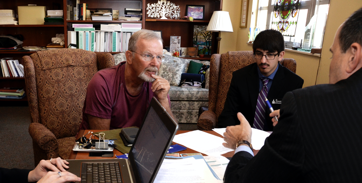 Men talk inside Stetson Elder Law center