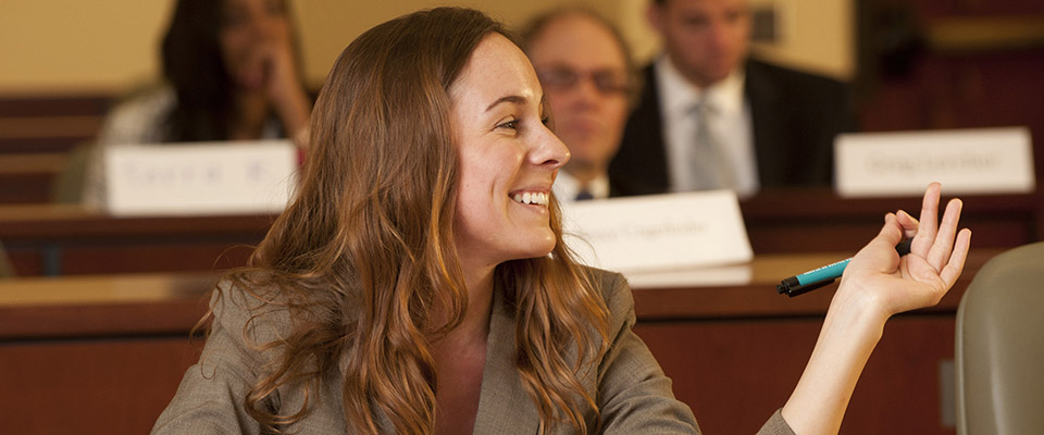 woman smiling and talking