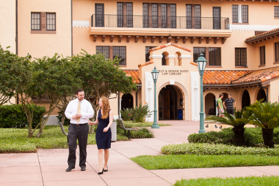 Students walk in front of the Stetson Law library