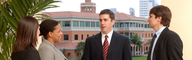 a group of students outside of the tampa law center