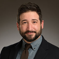Adam Shlahet headshot