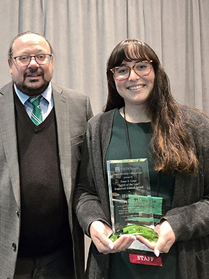 Hannah MacDonald holding award