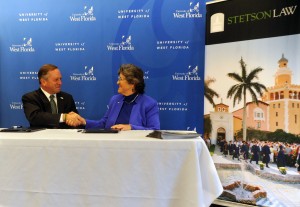 Stetson Law Dean Christopher Pietruszkiewicz signed an agreement with UWF President Judy Bense for a new 3+3 program. 