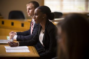 (L-R): Students and Darnesha Carter practice for a moot court competition.
