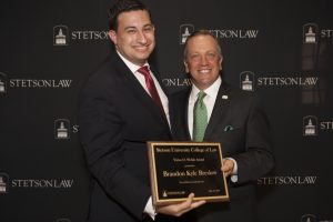 (L-R): Brandon Breslow and Stetson Law Dean Christopher Pietruszkiewicz at the May 2016 Honors and Awards ceremony at Stetson.