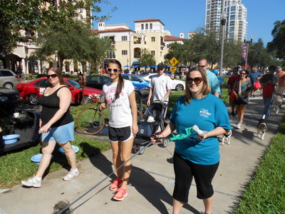 Volunteers walking pets at the Tampa Bay Pet Walk