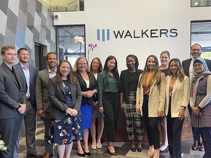 students in front of a walkers logo