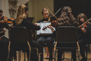 Violin students playing together