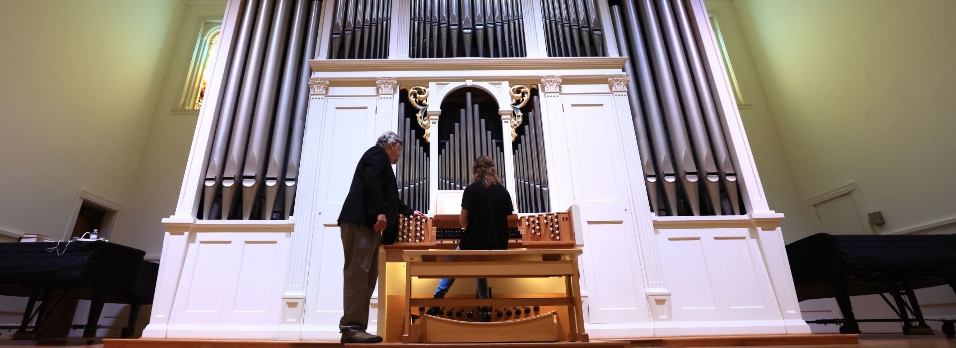 student playing the organ