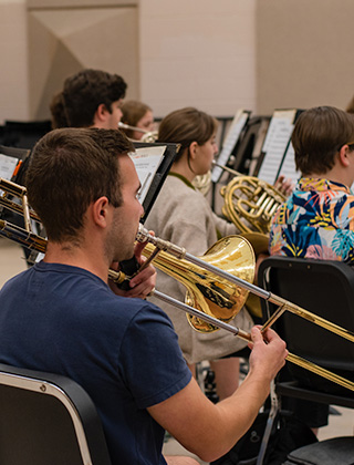 Brass and percussion students performing