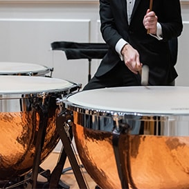 hands from person playing drums