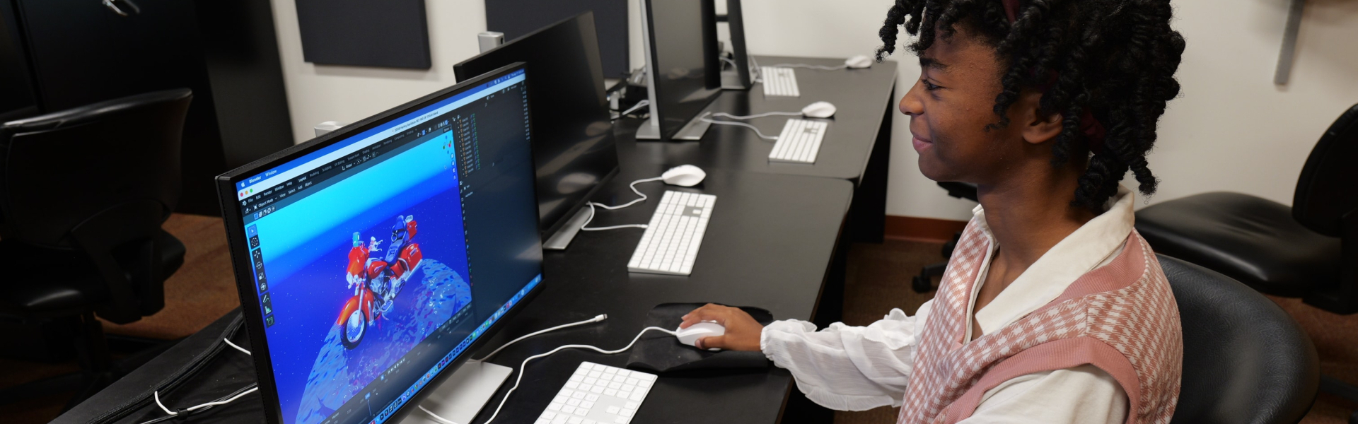 Student working with 3d models on a computer