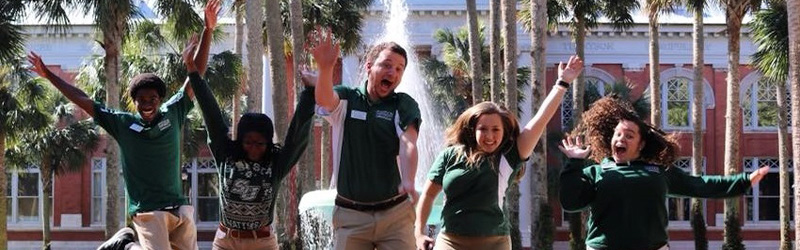 stetson students jumping in front of fountain