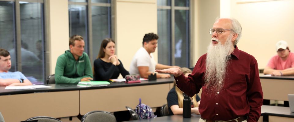professor giving a Statistics class