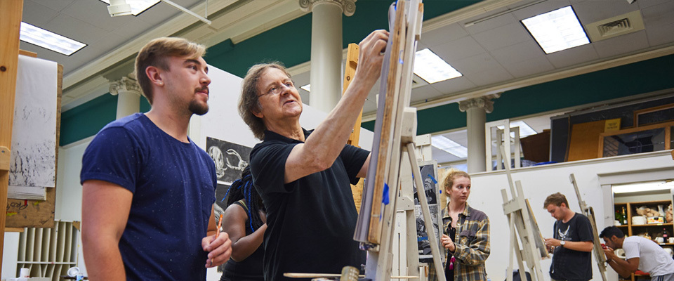 Art Professor Guiding Student