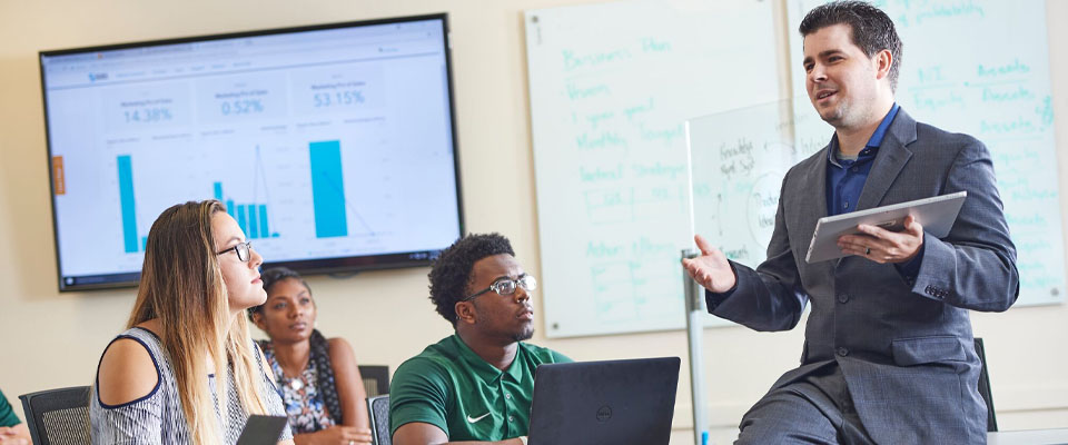 Professor teaching class of students