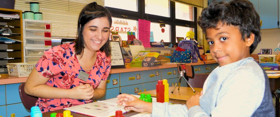 Education major working with young students