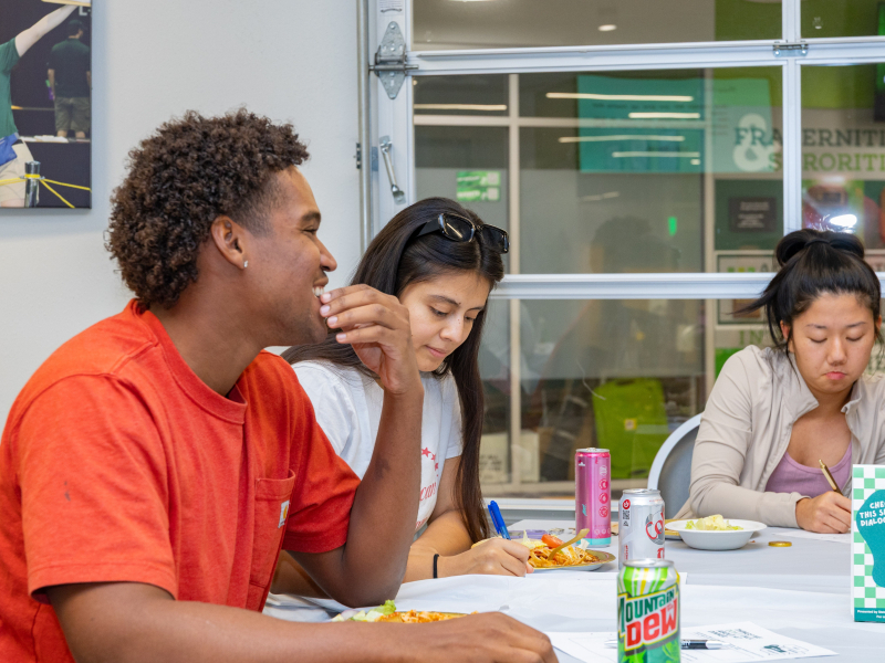 students during event talking and eating
