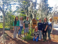 Ben Chase (center) extended his interest in native pollinators by trapping and identifying insects in the sandhill landscape and throughout Stetson University's campus.