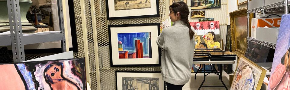 student taking out painting
