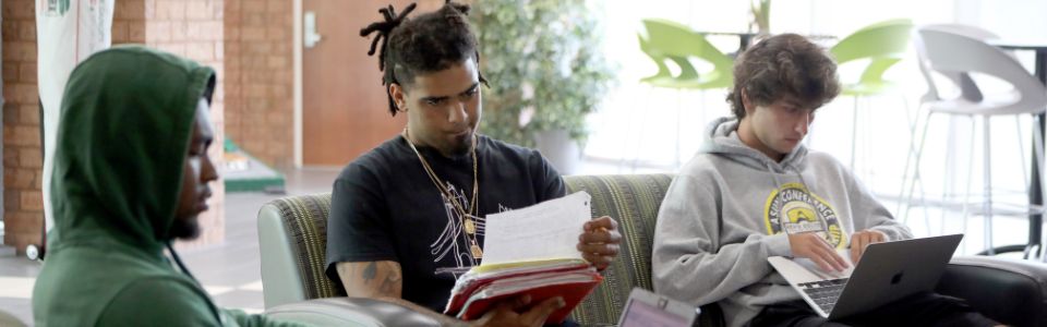 student looking at computer attentively