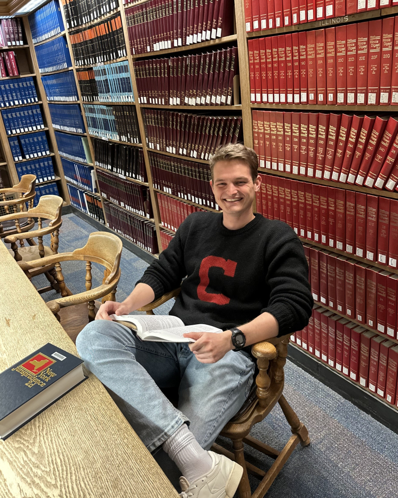 Wyatt Sise studying in the library