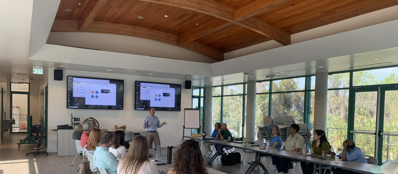 man giving presentation at the aquatic center