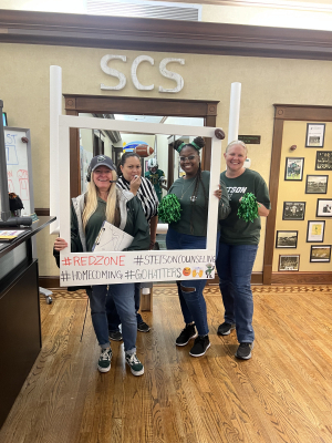 Members of the Student Counseling Services at their door decoration