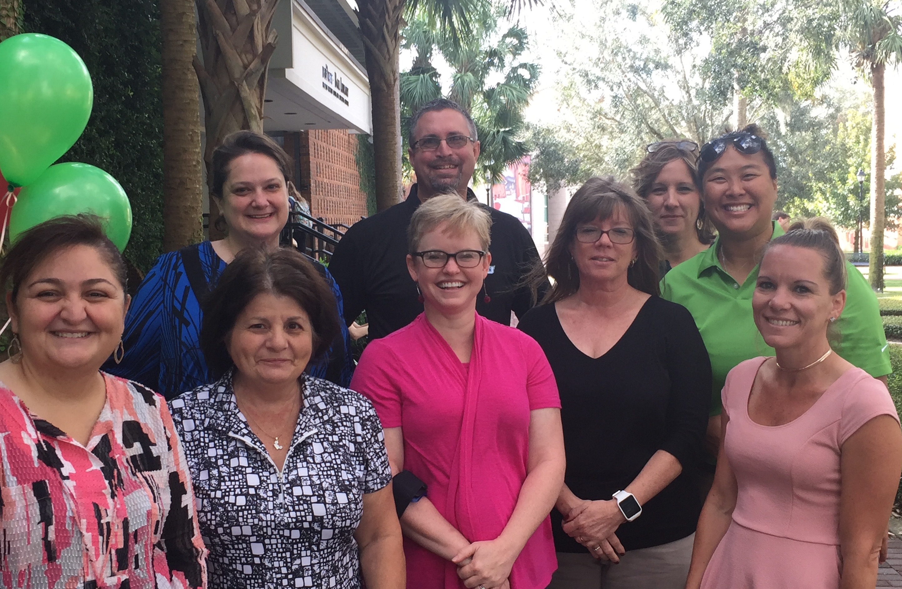 All council members smiling next to duPont-Ball library