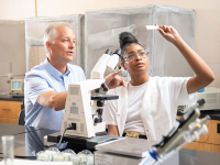 Faculty with student in the lab