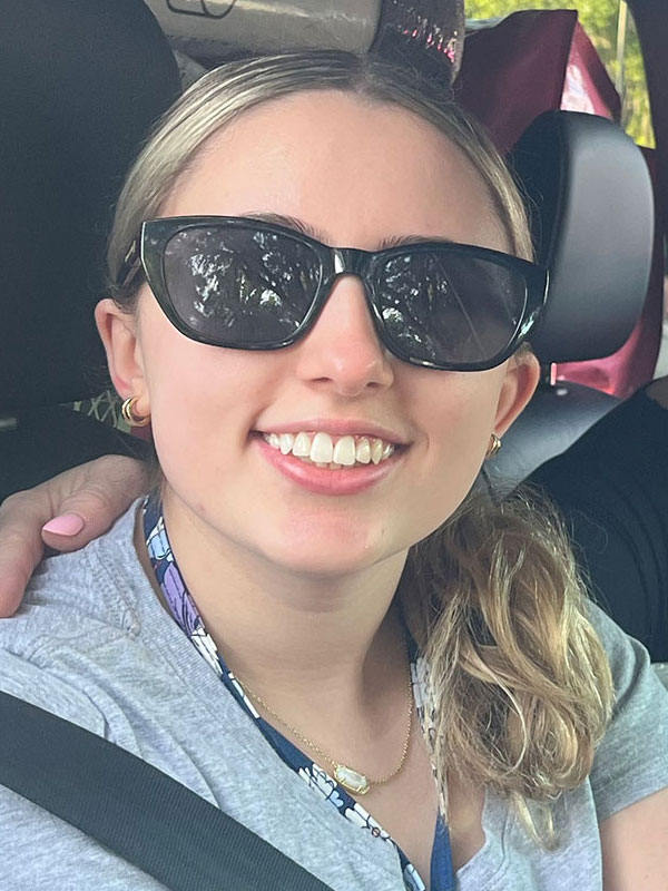 Kyla Hoffman in her car during move in day