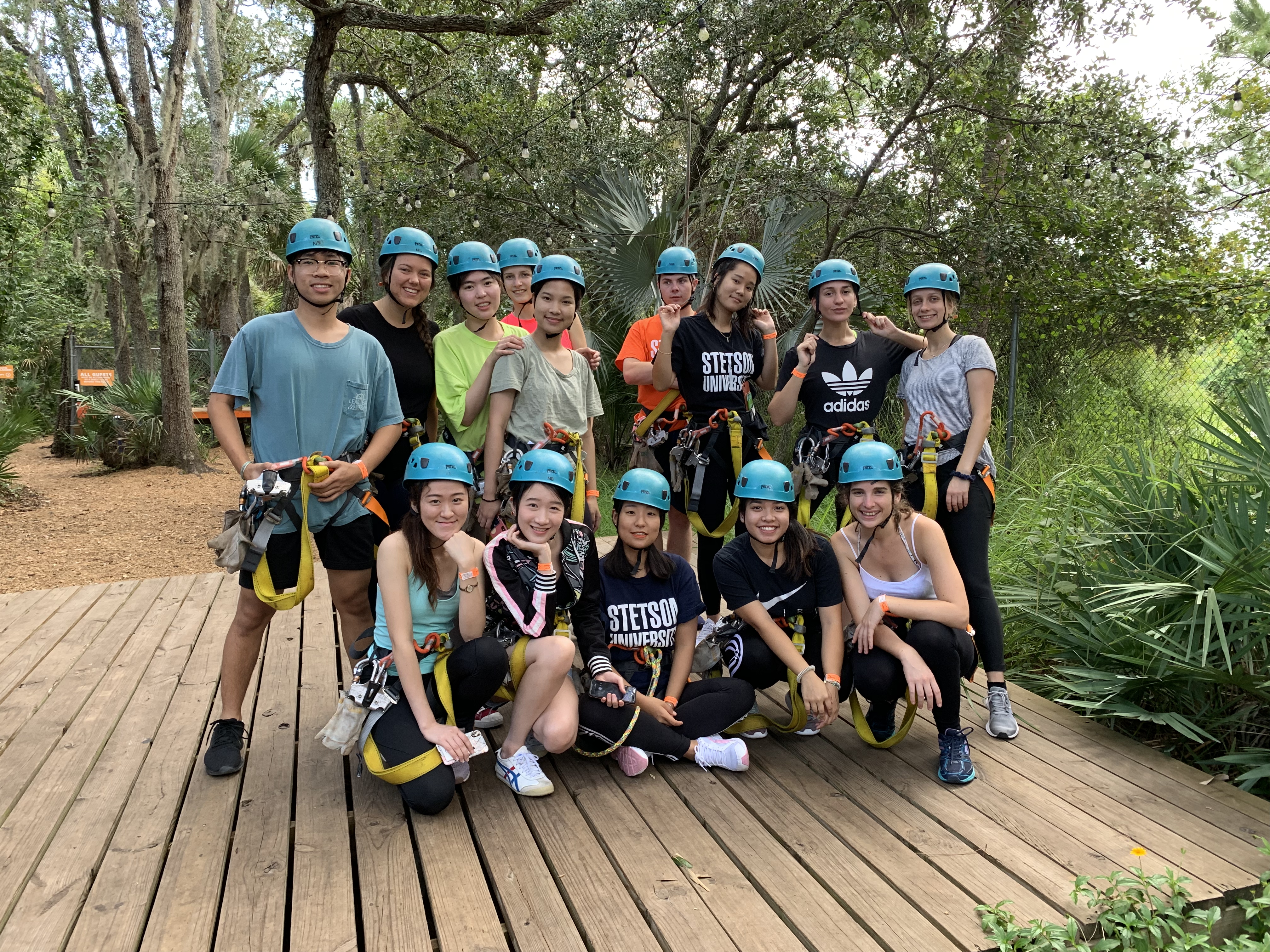 A group of students preparing for zipline