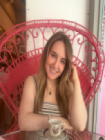 Alex having a beverage in a mug