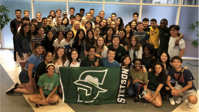 World Ambassadors together with the Stetson University flag