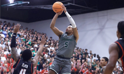 A Stetson University Basketball player shooting a basketball.