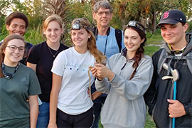 Dr. Terence Farrell in the field with students
